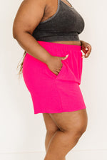 Load image into Gallery viewer, Breezy Airy Flowing Summer Shorts in Fuchsia
